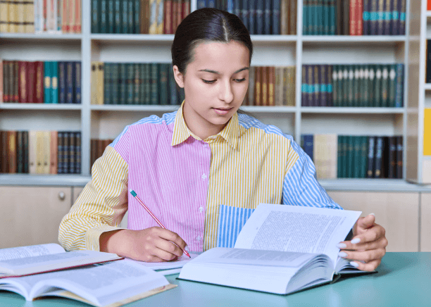 A student prepares an overseas university application with Translation Services in Somerville handling academic document.