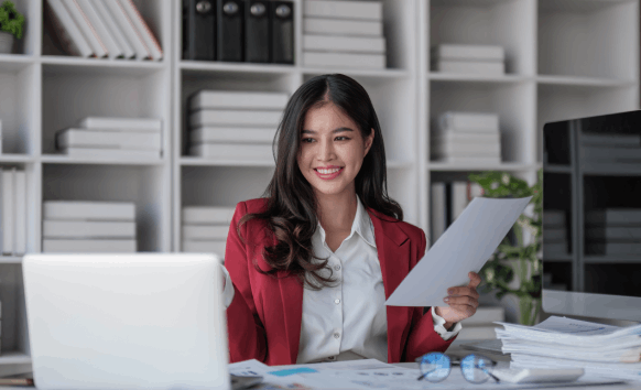 A certified translator reviews documents for Translation Services in Newton, ensuring fast and accurate results.