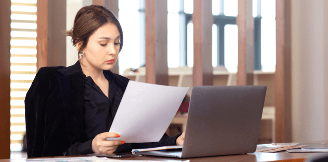 A professional translating documents for customers needing notarized Certified Translation Services for legal use.