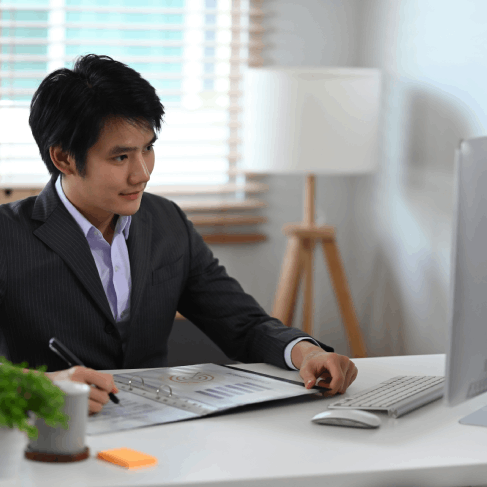 A translator formats a USCIS birth certificate using Chinese Translation Services in Massachusetts for a certified document.
