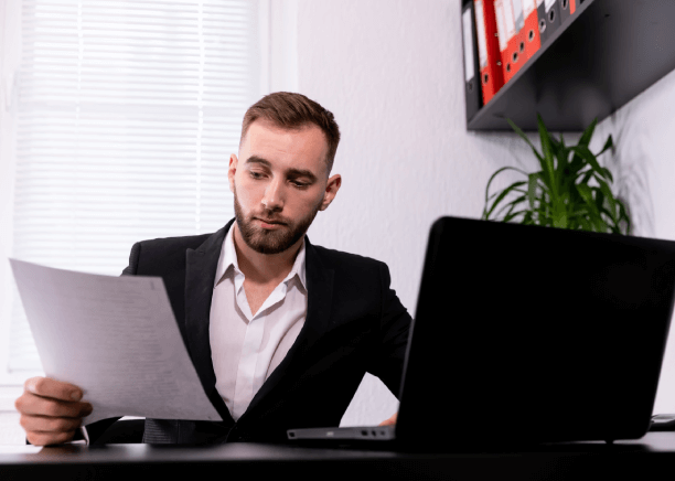 A professional translator working on official government Documents such as business licenses and immigration permits.