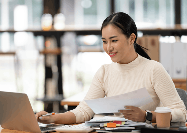 A client reviews an immigration form, using Chinese Translation Services in Massachusetts with guaranteed acceptance.