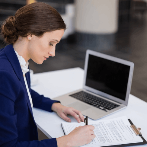 A reviewer proofreads a translated ruling as Translation Services in Lynn runs legal quality checks before court delivery.
