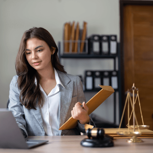 Lawyer reviews a bilingual contract as Translation Services in Malden deliver accurate legal translations for court use.
