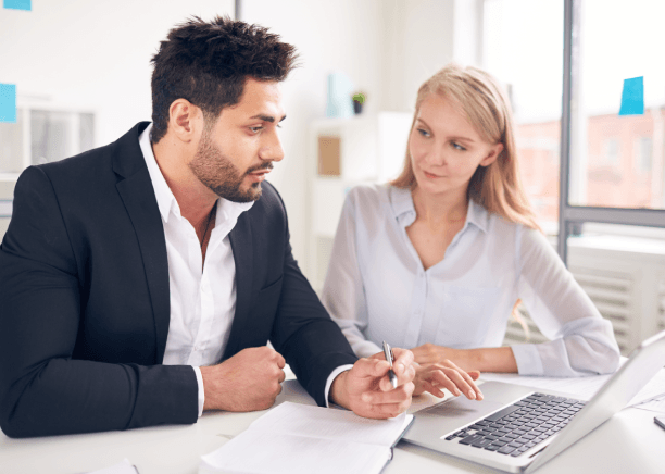 An expert translators in Quincy edits a business proposal on screen, delivering Translation Services in Quincy with care.