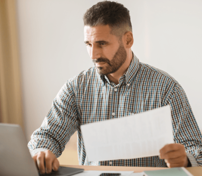 QA reviewer checks a Spanish technical report with Translation Services in Cambridge, verifying ISO-compliant formatting.