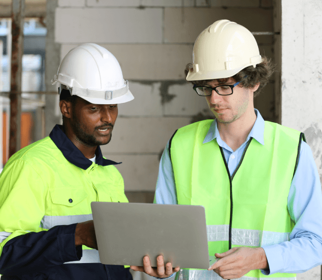 Engineer reviews a CAD manual using Translation Services in Somerville for technical text accuracy and formatting.
