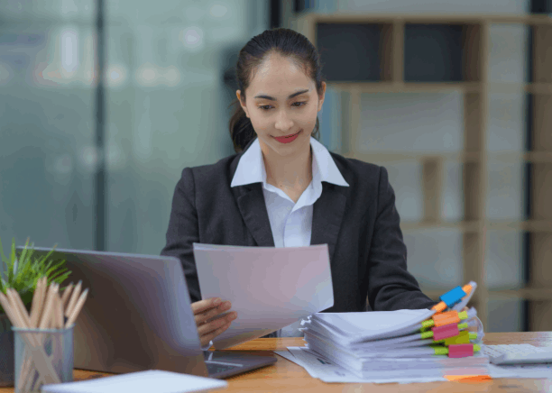 An expert linguist proofreads a multilingual document for Translation Services in Newton, ensuring accuracy and cultural fit.