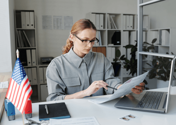 Translator proofreads a USCIS birth certificate translation, using Translation Services in Malden to avoid filing errors.