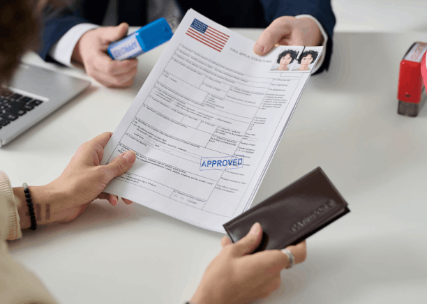 A sealed envelope holds USCIS-certified translations prepared by Vietnamese Translation Services in Massachusetts.